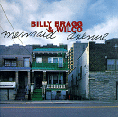 Mermaid Avenue Cd by Billy Bragg and Wilco - Track Listing: Walt Whitman's Niece, California Stars, Way Over Yonder In The Minor Key, Birds And Ships - (with Natalie Merchant), Hoodoo Voodoo, She Came Along To Me, At My Window Sad And Lonely, Ingrid Bergman, Christ For President, I Guess I Planted, One By One, Eisler On The Go, Hesitating Beauty, Another Man's Done Gone, Unwelcome Guest, The